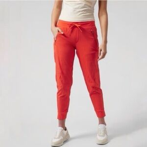 Athleta Trekkie North Mid Rise Legacy Joggers Size 10 Orange Hiking Pant Pockets